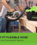 Workhorse Cordless 3-Gallon Wet And Dry Shop Vacuum Kit with 7 ft hose in use on a workbench next to a power tool