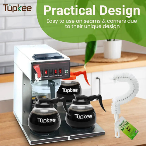 Coffee Pot Cleaning Brush With Curved Head For Easy Inside Scrubbing Non Scratching Soft Bristles Long Lasting Decanter Cleaner Fits Most Pots Pro Grade For Office And Restaurant Use next to a coffee brewer and pots on a countertop.
