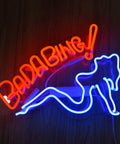 Bada Bing Bar Neon Light Sign 40 By 30 Cm Handmade Glass Neon Tubes On Transparent Backboard Wall Decor For Bedroom Office Pub Cafe Recreation Room No Installation Needed With On Off Switch And Easy Hanging Chain. Red and blue neon lights forming a sign with silhouette outline for decor.