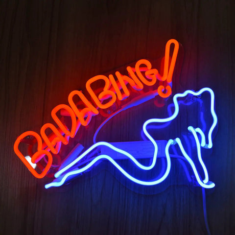 Bada Bing Bar Neon Light Sign 40 By 30 Cm Handmade Glass Neon Tubes On Transparent Backboard Wall Decor For Bedroom Office Pub Cafe Recreation Room No Installation Needed With On Off Switch And Easy Hanging Chain. Red and blue neon lights forming a sign with silhouette outline for decor.