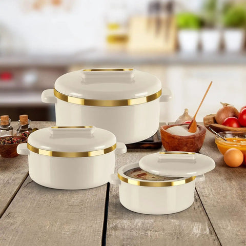 Stainless Steel Casserole Set Featuring Zero Sweat Double Wall Heat Lock To Keep Your Roti Gravy And Batch Cooked Meals Fresh Hot All Day Long Pro Grade Kitchen Storage Containers Set Of Three Ivory display on wooden countertop with golden accents.