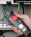 Person testing electrical wires with DC Current Clamp Meter 6000 Counts Digital Multimeter Amp Continuity Ohm Hz Live Check V Alert Voltage Tester