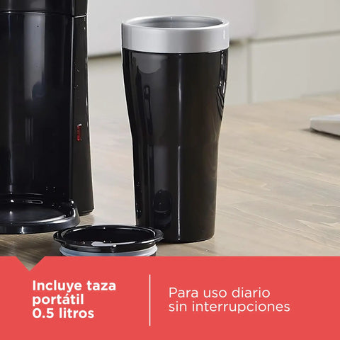 Compact Single Serve Coffeemaker That Brews Right Into The Included Travel Mug, shown with black travel mug and lid