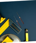 Close-up of two steel awls with wooden handles placed beside measuring tools, showcasing the 15 Piece Straight Cone Awl Set with Durable Wooden Handle for Leathercraft Sewing and Woodworking Hole Punch Projects Makes Nifty Marks with Slick Precision Every Time You Need a Go-To Tool to Whip Up Custom Crafts in No Time.