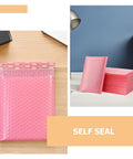 Pink Bubble Padded Mailers Self Seal Envelopes 100 Pack for Jewelry and Makeup Supplies shown on a desk.