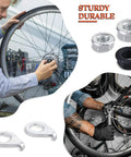 Mechanic using Must Have Mountain Bike Axle Nut And Safety Washer Kit with M8 M9.5 M10 nuts for wheel repair.