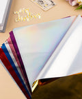 Hot Foil Paper Dope 20x29cm 50 Sheets Mixed 16 Colors for Scrapbooking Card Making DIY Albums on table