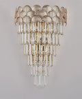 European Style Indoor Wall Sconce Featuring Cut Crystal Accents And Brushed Metal Frame For Hallways Bedrooms Or Living Rooms Delivers Smooth Ambient Lighting To Level Up Your Home Decor Game Tonight, showcasing a gold leaf design and cascading crystals.