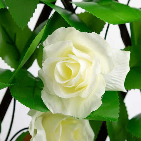 Close-up of white flowers on the Expandable Faux Ivy Fence Screen for Balcony and Patio 16x45 Inch Closed Expands to 92 Inch Wide Willow Frame
