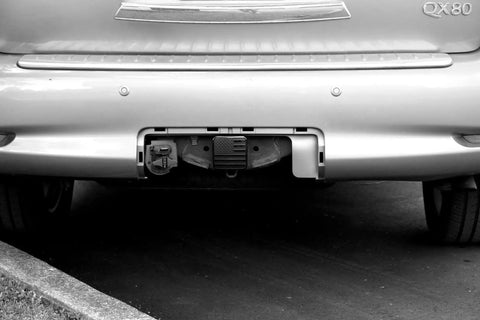 SUV rear with 2 Inch Trailer Hitch Cover Plug With Metal American Black Flag Universal Fit For Any 2 Inch Hitch Receiver installed