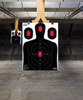 Indoor range with silhouette shooting target bulk pack of 50 in black 18 by 24 inches with multiple aiming zones for practice