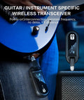UHF Wireless Guitar System With Rechargeable Transmitter And Receiver connected to electric guitar near amplifier