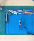 Adjustable Length ESD Wrist Strap With Retractable Coil Lead For Electronics Repair on workbench with tools