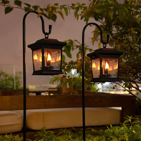 Outdoor Solar Lanterns Waterproof Hanging Lights for Garden Patio Lawn Pathway and Wall Flickering Ambience Durable IP65 Weatherproof No Wires Ideal Gift for Women and Home Decor Enthusiasts glowing at night