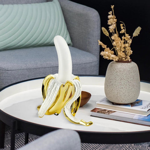 Banana Shaped Table Lamp With LED Night Light Modern Resin Banana Lighting Fixture on living room table.