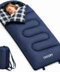 Child sleeping in Kids Sleeping Bag For Sleepovers And Camping 3 Season Warm And Cool Lightweight And Washable with plaid lining