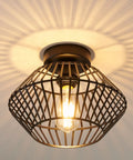Black Flush Mount Ceiling Light With Dope Metal Cage Design And Industrial Vibe For Hallways Kitchens Porches And Bedrooms Vintage Farmhouse Style That Casts Dramatic Shadows When On And Elevates Any Ceiling Space.