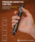 Person holding Cordless Engraving Pen Kit With 5 Variable Speeds, showing pressure-sensitive control for artists and DIYers