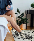 Woman wearing Scythe Themed Dope Ankle Socks For Men And Women Breathable Athletic Low Cut Socks With Durable Print relaxing indoors.