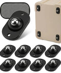 Peel And Stick Caster Wheels For Couches And Coffee Makers 360 Smooth Swivel Silent Rollers In Black Heavy Duty 8 Pack with shiny ball bearings.