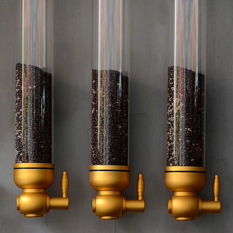 Killer Wall Mounted Coffee Bean Dispenser With Durable Aluminum And Clear Acrylic Canister Totally Airtight 5KG Storage Jar For Home Baristas Or Cafe Stash In Glossy Gold Two Pack with three jars filled with coffee beans.