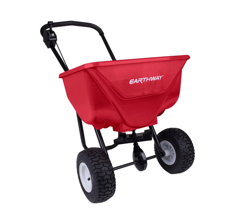 Commercial Walk-Behind Broadcast Spreader With 65 Lb Capacity, red hopper, 10 inch pneumatic tires, side spread control, lawn care tool