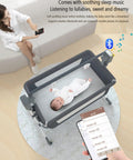 Smart Electric Baby Bedside Crib And Bluetooth Bassinet For Room Sharing With Automated Remote Control Smooth Swaying Motion And Built In Lullabies For A No Sweat Parenting Vibe Pink with soothing music and Bluetooth connection.