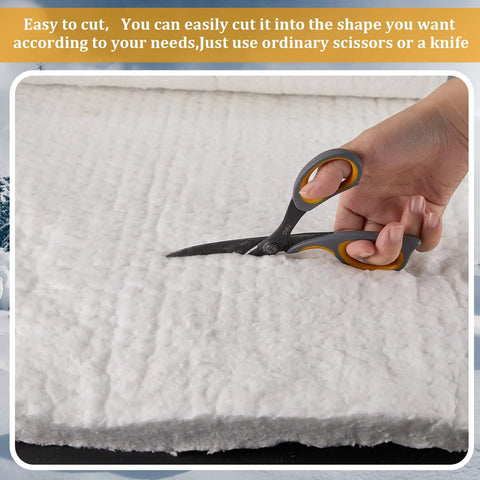 Front view of Amylove ceramic fiber insulation blanket, 60 x 24 x 1 in, white, being cut with scissors.