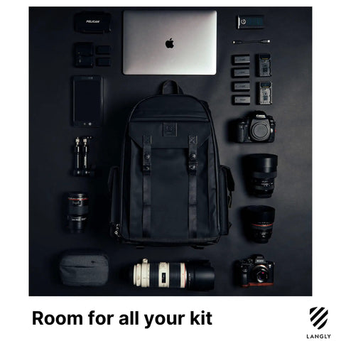 Large Customizable Camera Backpack For Pro Photographers With 16 Inch Laptop Pocket And Exterior Tripod Straps displayed with gear