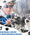 Mechanic installing 48 Piece Bike Nuts And Safety Washers Kit With M8 M9.5 M10 Sizes on bicycle wheel hub with gloves.