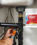 Transparent Waterproof Sealant For Walls And Surfaces, 100g Quick Bonding Invisible Repair Adhesive applied to a pipe under a sink