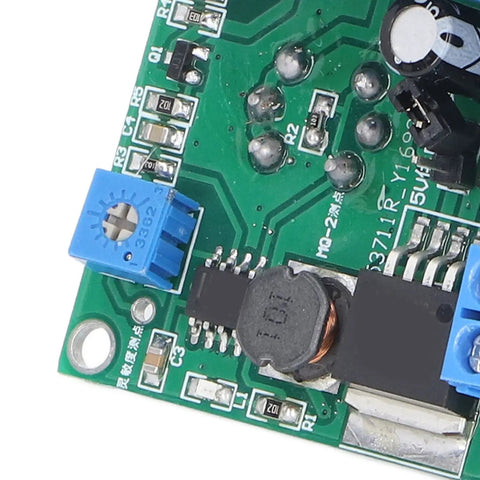 Close-up view of the Dead On Accurate MQ2 Smoke Detector Module Featuring Sharp Alarm Buzzer And Relay Switch circuit board.