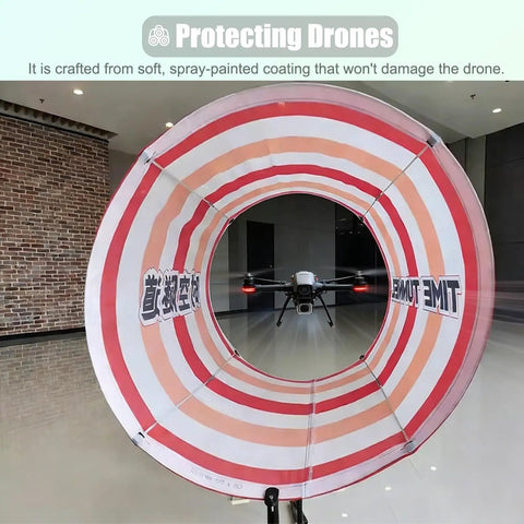 Drone flying through a red and white striped cloth obstacle from DIY Drone Obstacle Course Kit For FPV Racing, Beginner Friendly Practice Set To Build Custom Race Tracks, Sturdy Lightweight Cloth Obstacles For Drones Under 60 cm, Long Range Challenge For Competition Or League Play