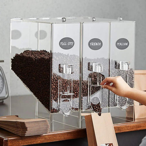 Kick Up Your Snack Station Game With This 9 Lb Acrylic Dry Food Dispenser 3 Pack Clear Bulk Bin for coffee beans on countertop.