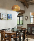 Dining room with a Boho Rattan Pendant Lamp With Hand Woven Wicker Rope Shade Dome Ceiling Basket Chandelier LED Industrial Hanging Light