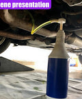No Sweat Hand Pump For Standard Quart Bottles With Dual Suction Tubes And 28 Millimeter Caps in use under a vehicle.