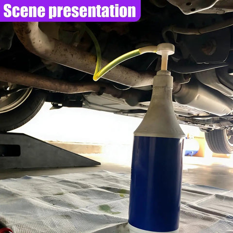 No Sweat Hand Pump For Standard Quart Bottles With Dual Suction Tubes And 28 Millimeter Caps in use under a vehicle.