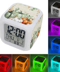 Hella Durable Digital Alarm Clock With LED Night Light And Seven Color Modes Snooze Button Time Date Temperature Display Retro Cube Desk Clock For Bedroom Or Office Smooth As Butter Setup showing colorful illumination options.