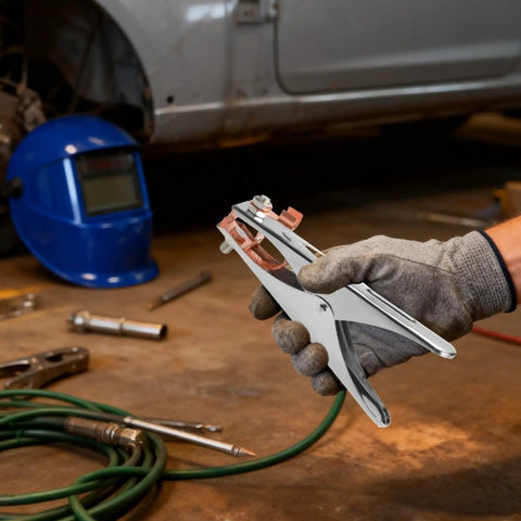 Heavy Duty Welding Ground Clamp With 500A A Shape Copper Jaw held in gloved hand, showcasing stability and ease of use in workshop.