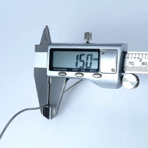 Measuring 304 Stainless Steel Wire Rope 1/16 Inch X 328 Foot Spool With 7X7 Flexible Design using digital caliper.