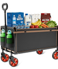 All Terrain Collapsible Wagon Cart With 220 Lb Load Capacity filled with groceries including water, milk, fruits, and vegetables.