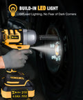 Badass Half Inch Brushless Cordless Impact Wrench Killer Performance 650 Ft Lbs Torque in use with LED light on wheel bolts.