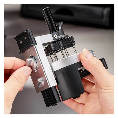 58mm Espresso WDT Distribution Tool With Twelve Sleek Needles And Fully Adjustable Depth being adjusted in hand.