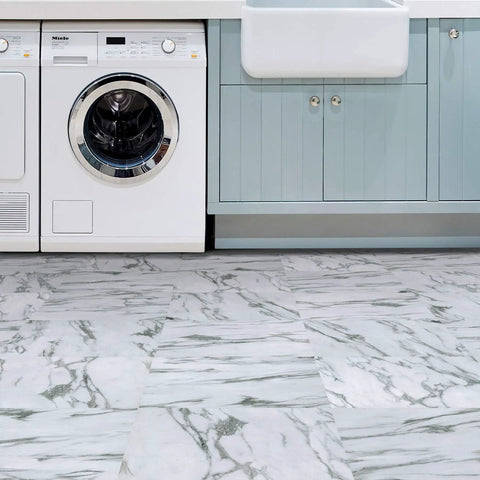 Opaline Peel And Stick Floor Tiles White Marble Look Vinyl Flooring for kitchen shown with washer and cabinets