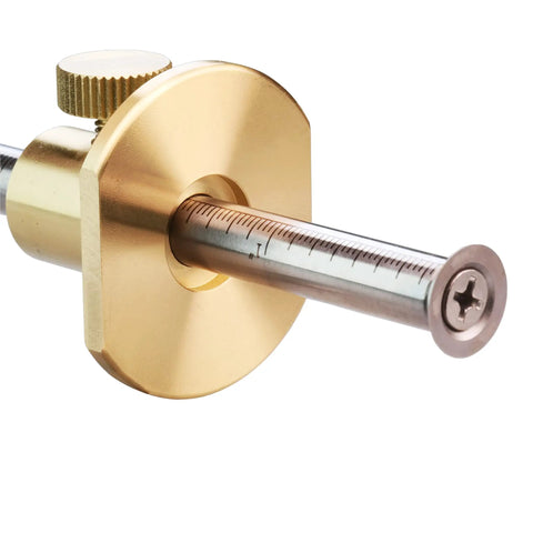 Close-up view of the Professional Grade Brass Wheel Marking Gauge Kit Including Two Spare Cutter Wheels And Precise Metric Micro Adjuster Ruler.