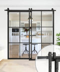 Bypass Double Glass Barn Door 84 By 84 Inches With 7.5 Foot Side Mounted Hardware Kit installed in living room setting.