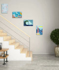 Modern home with 4 Pack Sublimation Glass Photo Blanks 11.8 Inch Long and 7.87 Inch Wide Wall Mount Frames displayed on staircase wall.