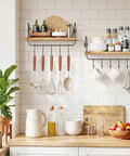Legit Pine Wood Floating Wall Shelves With Ten Adjustable Mug Hooks For Your Best Coffee Bar Setup Yet Rustic Industrial Brackets and Heavy Duty Storage Rack displaying kitchen items.