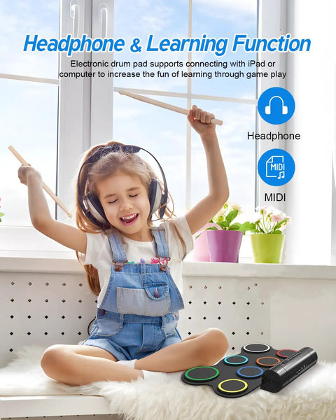 Child using Roll Up 7 Pad Electronic Drum Set Midi Drum Kit With Headphone Jack Built In Speakers And Stomp Pedals Sticks