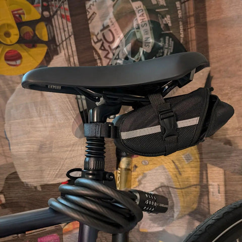 Bike Suspension Seat Post With Adjustable Spring Coil Damper, 27.2/30.4/30.9/31.6mm Diameters, shown with attached bike bag.